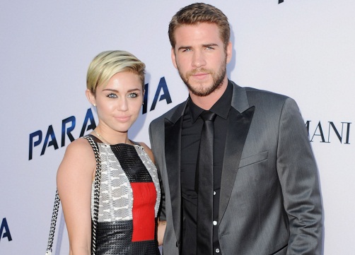 LOS ANGELES, CA - AUGUST 08:  Singer Miley Cyrus and actor Liam Hemsworth arrive at the Los Angeles Premiere "Paranoia" at DGA Theater on August 8, 2013 in Los Angeles, California.  (Photo by Jon Kopaloff/FilmMagic)